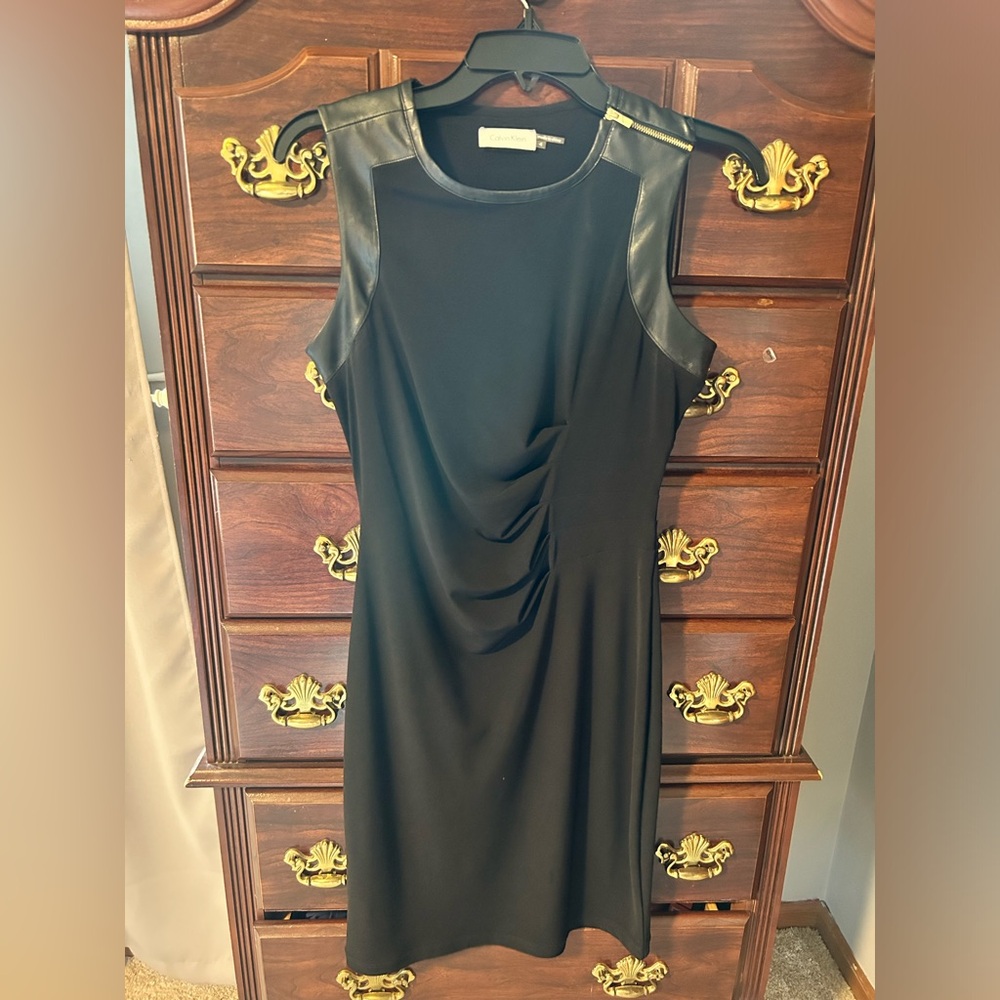 Black Calvin Klein dress with gold and leather details, size 4